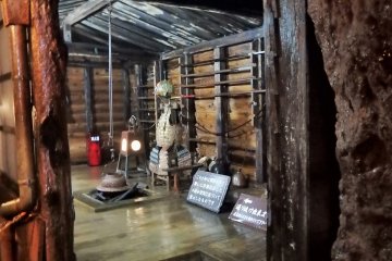 The wet and clammy guard house - complete with armor and weaponry.
