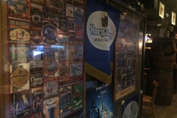 The walls are covered from top to bottom with memorabilia.