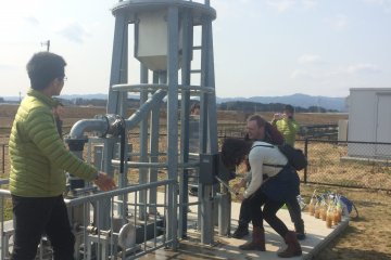 A handpump for visitors to try their hand at producing energy from a different source than solar.
