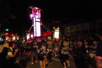 The giant lanterns are carried on wagons