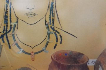 Tubular stone beads were found like depicted here, (museum exhibit)