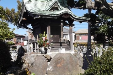 An intricately constructed little side shrine