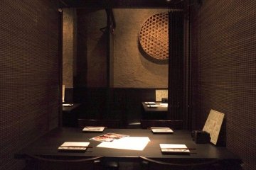 A sample private table for four, curtains can be closed all around for privacy