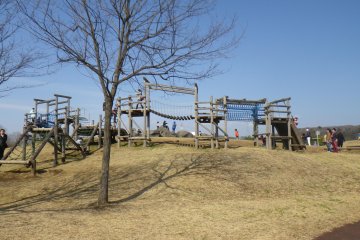 Climbing adventure park for kids with a short zip line