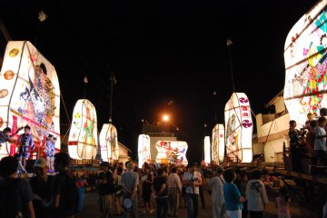 Floats lined up, waiting to be paraded around the neighborhood