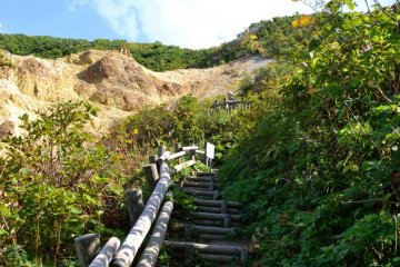The hike takes about 10 minutes each way — depending on your speed — and follows a well maintained trail.