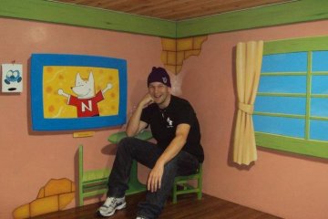 Tiny chair, tiny house, regular sized me.