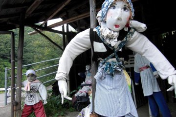 More scarecrows rest in the farmer's shack.  Many are used to raise awareness of safe driving while others serve a more traditional purpose in the fields.