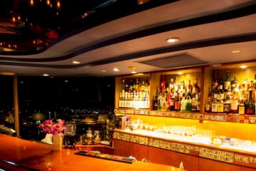 Relax with an evening drink at the rooftop Sheesah Lounge