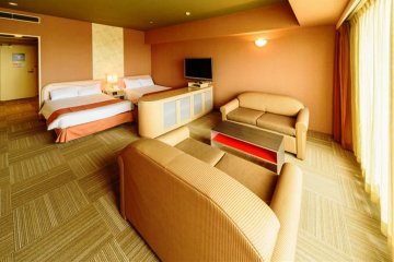Spacious rooms with a lounge and balcony