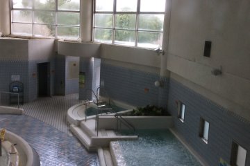 Hot tub, and behind that a cool pool