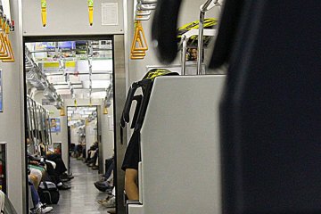 Yippie! On the JR-train on our way to Yokohama City!