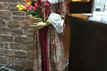 Museum entrance. Period clothes like these are available for rent for picture taking. 