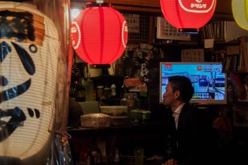 Conversing with the shop owners
