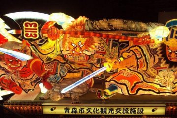 The grand hall houses several full size Nebuta floats.