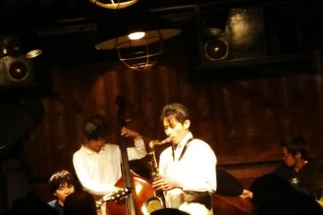 One of two saxophonists that night
