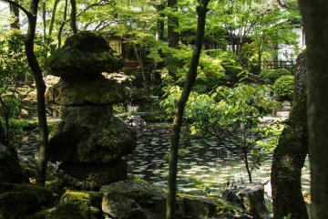 Traditional Japanese statues throughout.
