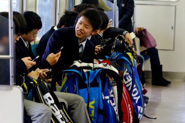 Middle school students going to their extra curricular activities via train