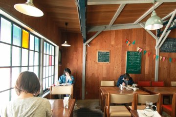 The window pane gives off a natural lighting into the cafe