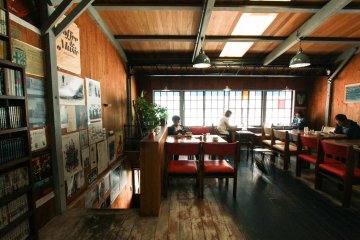 Posters about music and Kyoto's art scene are posted on the wall