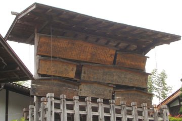 Ancient wooden placards display the town's laws