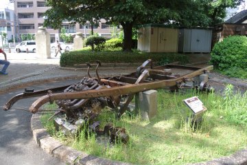 More things that were melted in the fire are placed outside the museum