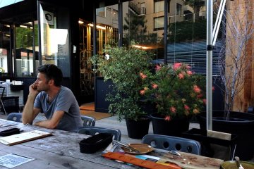 Tables on the terrace are perfect for warm weather
