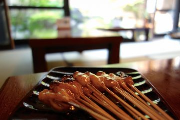 Savouring my roasted mochi, while appreciating the beautiful courtyard garden