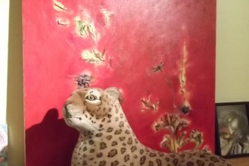 <p>One of the Cow's regulars guarding the artwork</p>