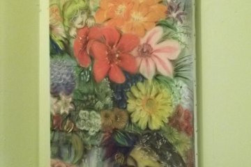<p>That painting casting gentle colors over the couch</p>