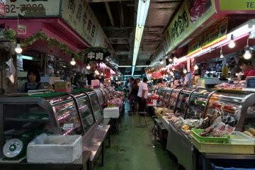 Rows of stores beckon on the first level of the Makishi Public Market
