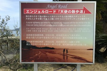 Papan yang mengarahkan Anda ke Jalan Malaikat
