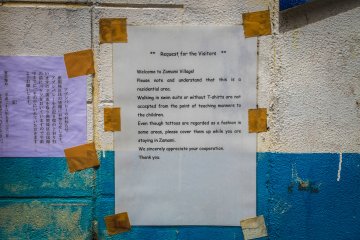 A message for the visitors: please cover up your tattoos