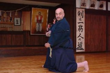 Martial artist-turned-tea master. Randy Sensei training Iaido