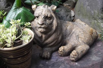 One of the numerous little statues