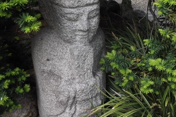 This statue is cooling off in the shade