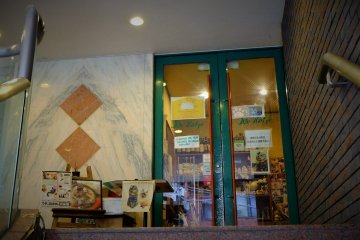 The entrance at the top of the stairs