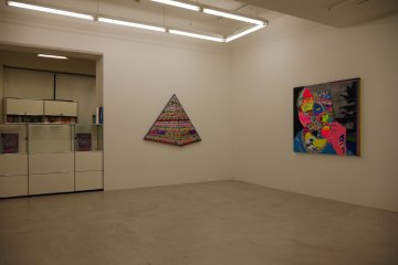 Nanzuka Gallery's white walls make Erik Parker's vibrant work stand out