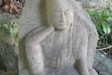 Some of the statues are damaged or weathered with age