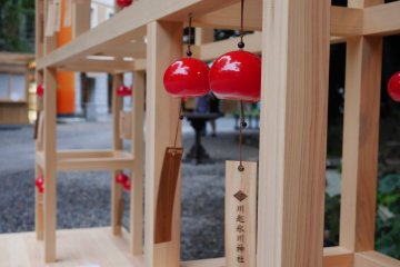 These red wind chimes make delicate sounds in the wind