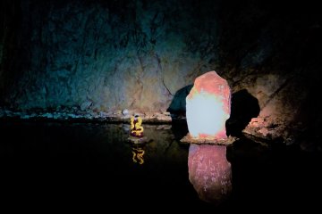 Inside the cave is this stone monument called the Enoshima Iwaya.
