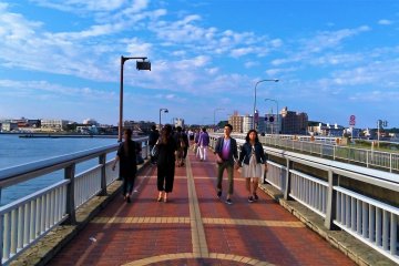 Enjoy the beach view along the Enoshima Benten-Bashi bridge which is the same way going back to the train station of Enoshima.