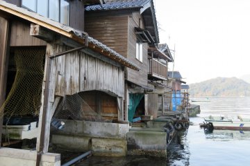 Many fisherman live in Ine Village in boathouses like these