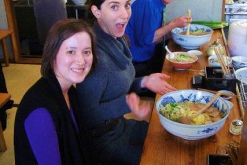 Three happy costumers enjoying the tokudai sized ramen. Delish!