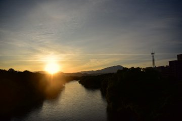 Sun setting over the Kitakami River