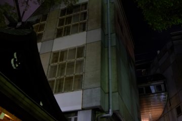 Osaka's high rise modern buildings overlook the shrine