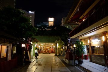 A lone salaryman wanders through