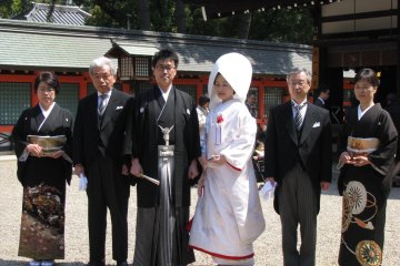 Bride & groom with parents from both sides