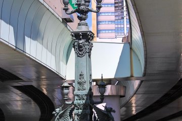 A part of Nihonbashi bridge with a modern highway above it