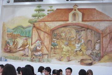 Wall painting in the hall shows the history as originally beer came to Japan from Czech Republic